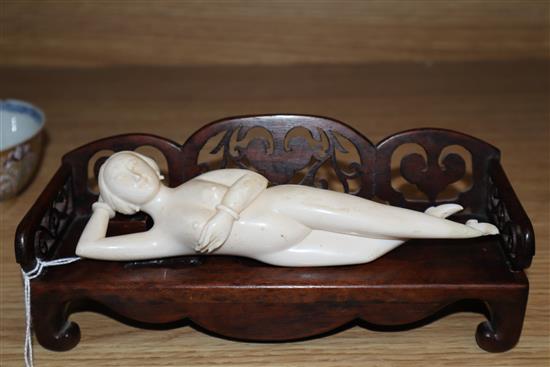 A Chinese ivory doctors figure with a hardwood stand, c. early 20th century